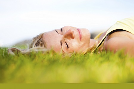 woman lying in the grass small